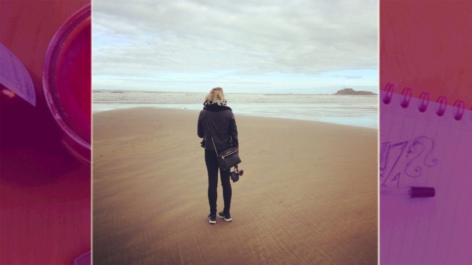 girl standing alone on a Scottish beach at Archerfield House